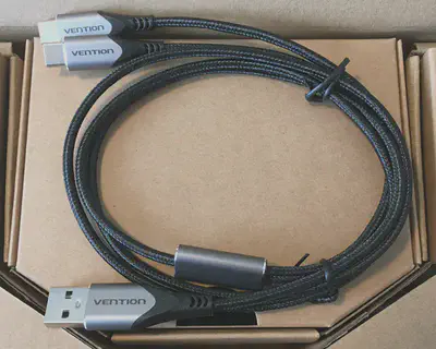 a picture of a braided cable with 1 USB-A to 2 split USB-C connectors